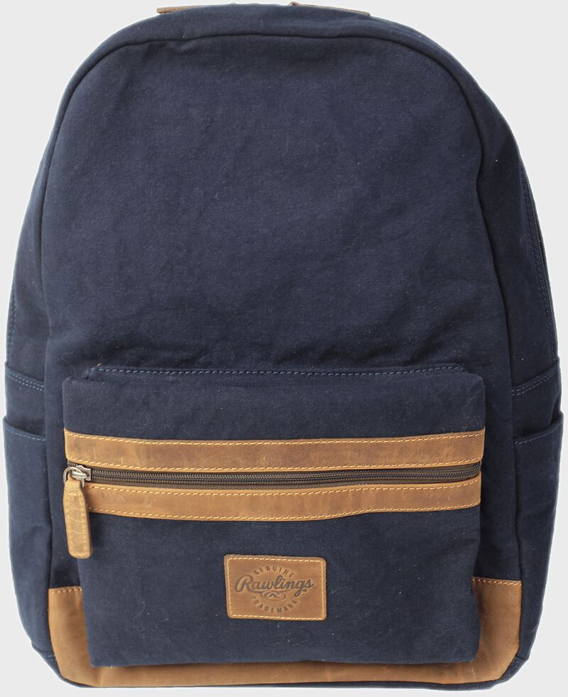 Front of a navy V164-400 Canvas Collection backpack with a brown label and brown zipper on the front pocket